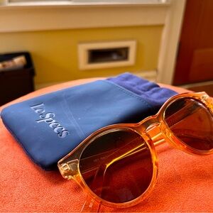 Polarized Le Specs sunglasses in translucent blonde.